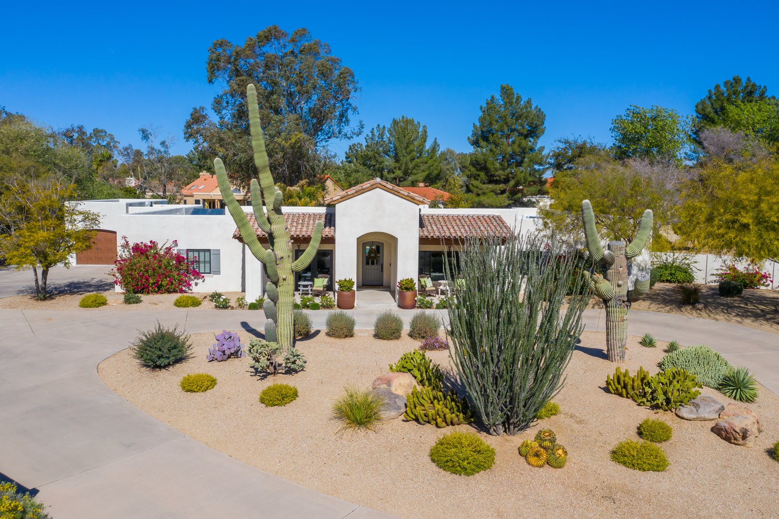 Aerial view of a custom desert-landscaped estate in the Cactus Corridor