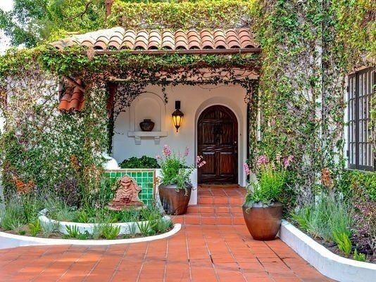 Ivy-covered Spanish Colonial Revival entry in a Phoenix historic district