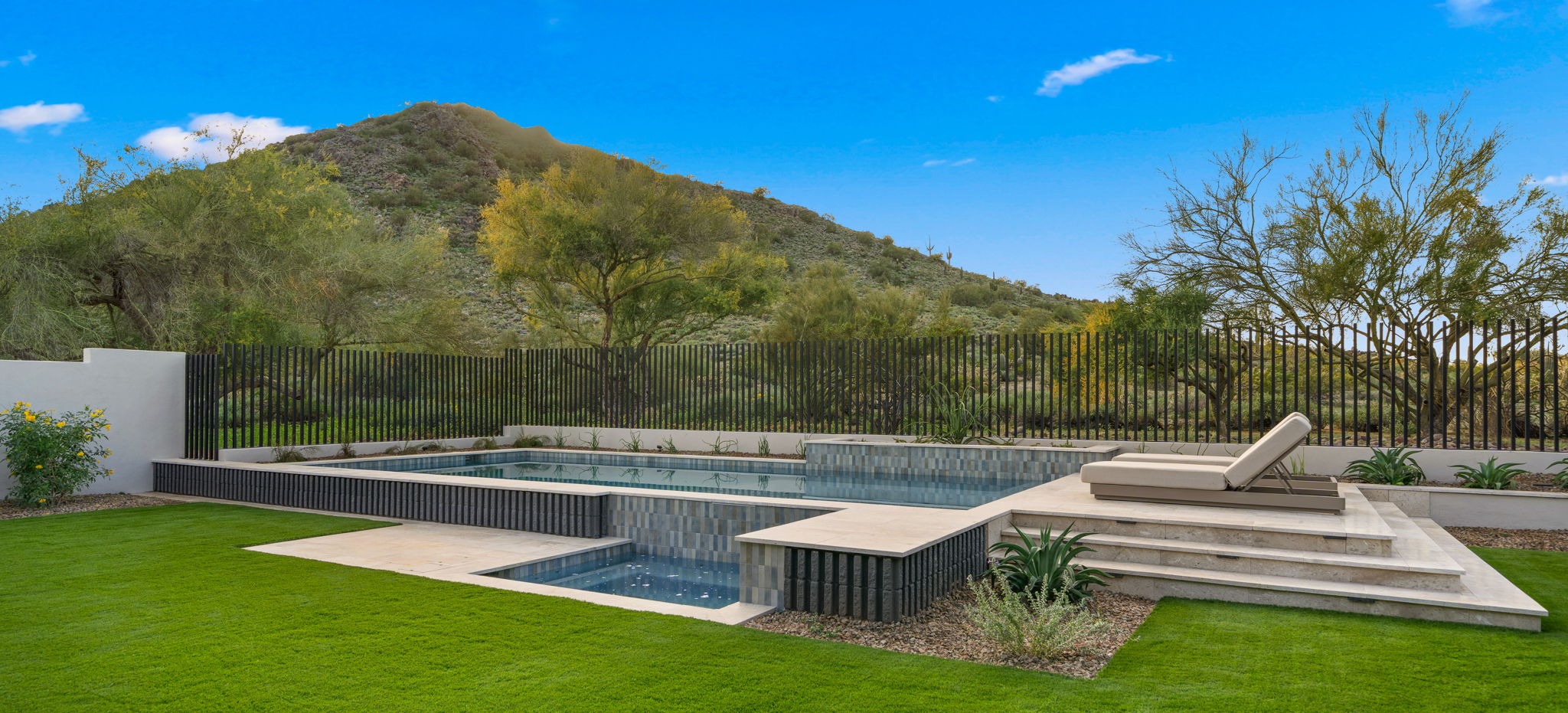 Backyard pool and spa with desert mountain views at a Scottsdale-area luxury home